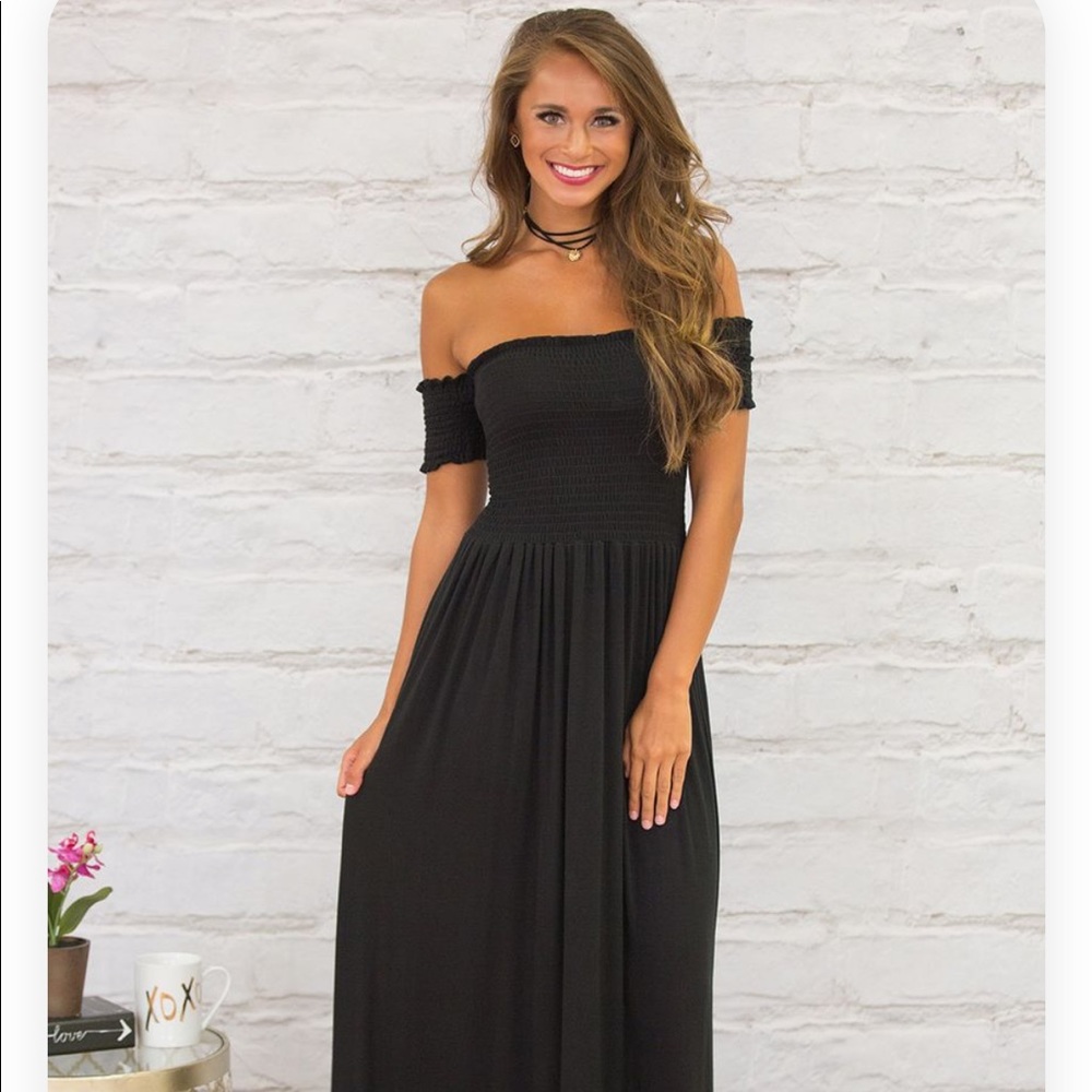 Black strapless maxi dress.